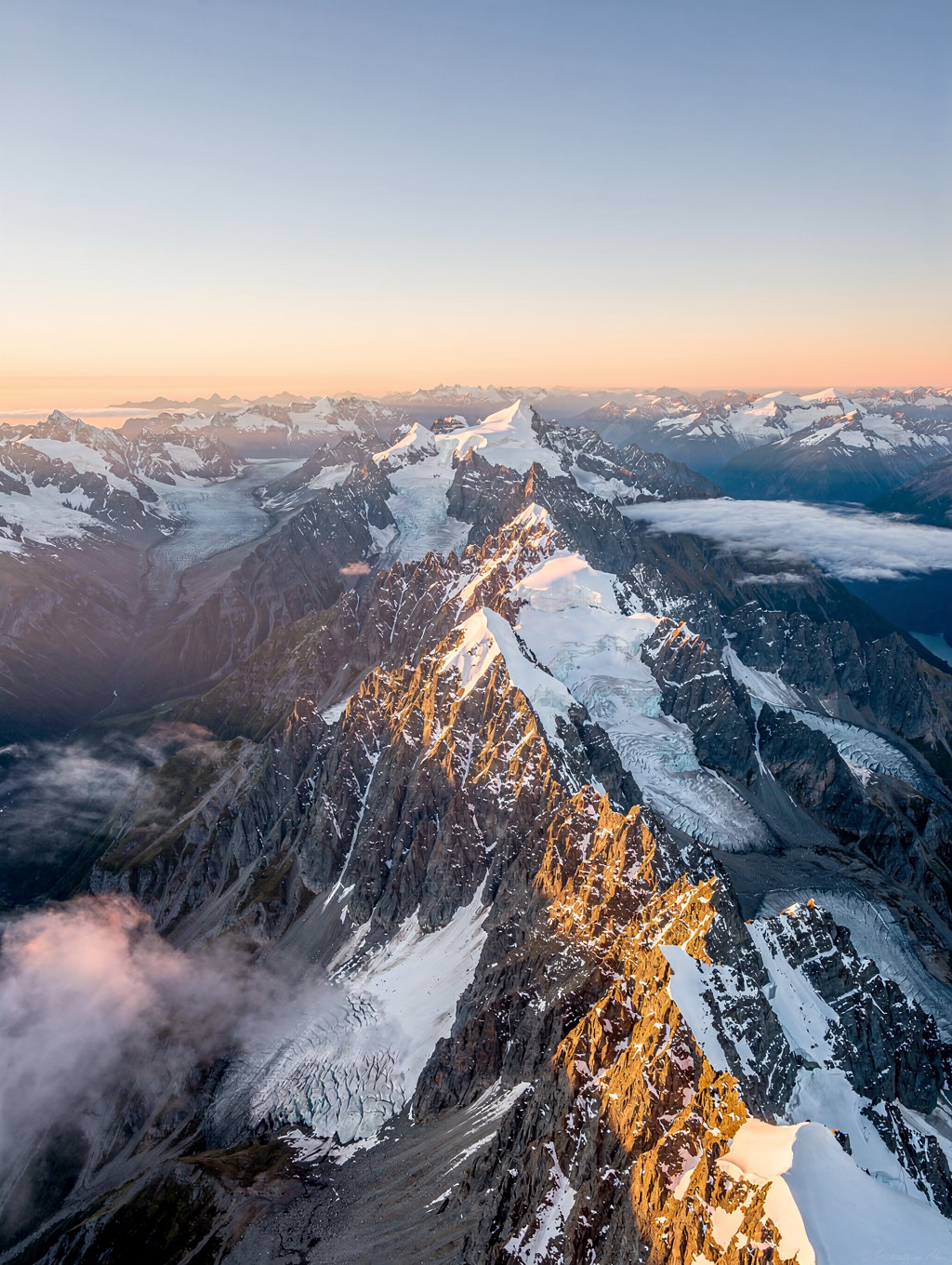 Dense mist rolling over New Zealand mountain ranges